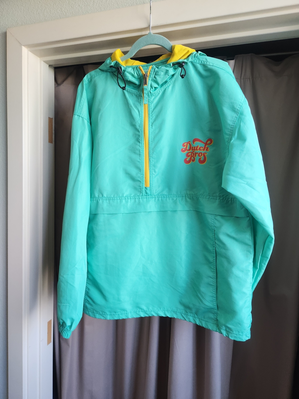 Dutch Bros Teal Hooded Windbreaker Jacket with Yellow Trim